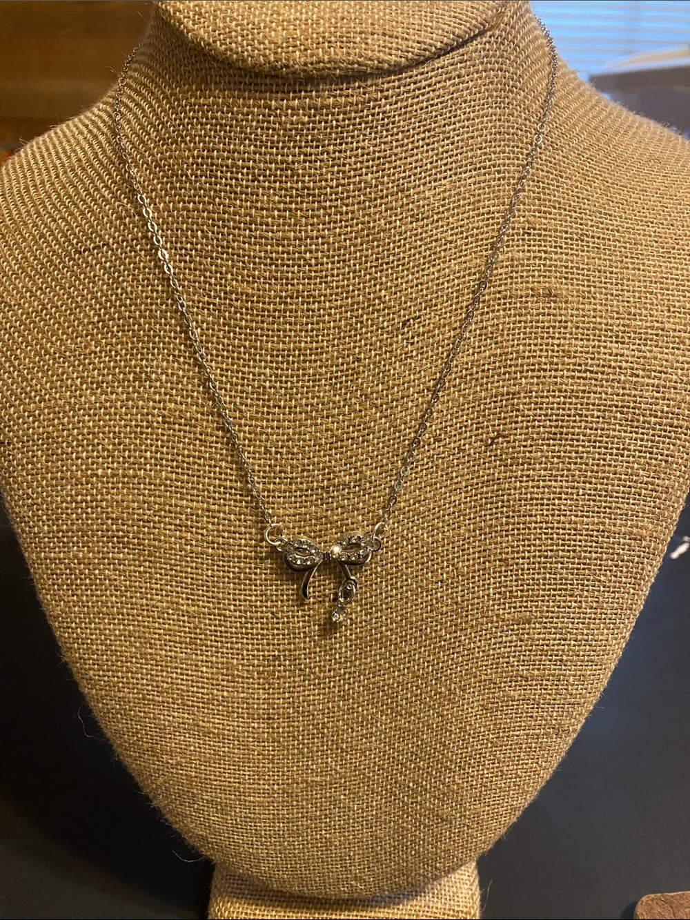 Dainty Silver Bow Pendant Necklace with Sparkling Accent
